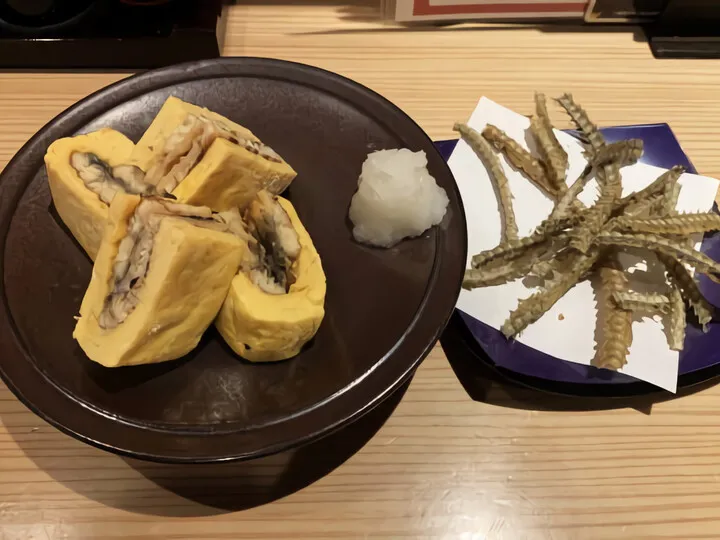 う巻
